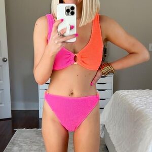 Pink and orange two piece swimsuit